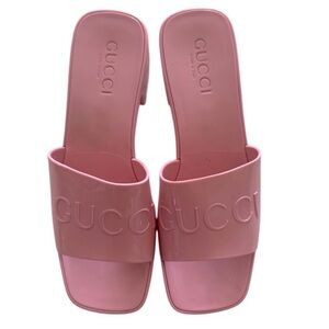 Gucci Pink Embossed Logo Rubber Slide Mules